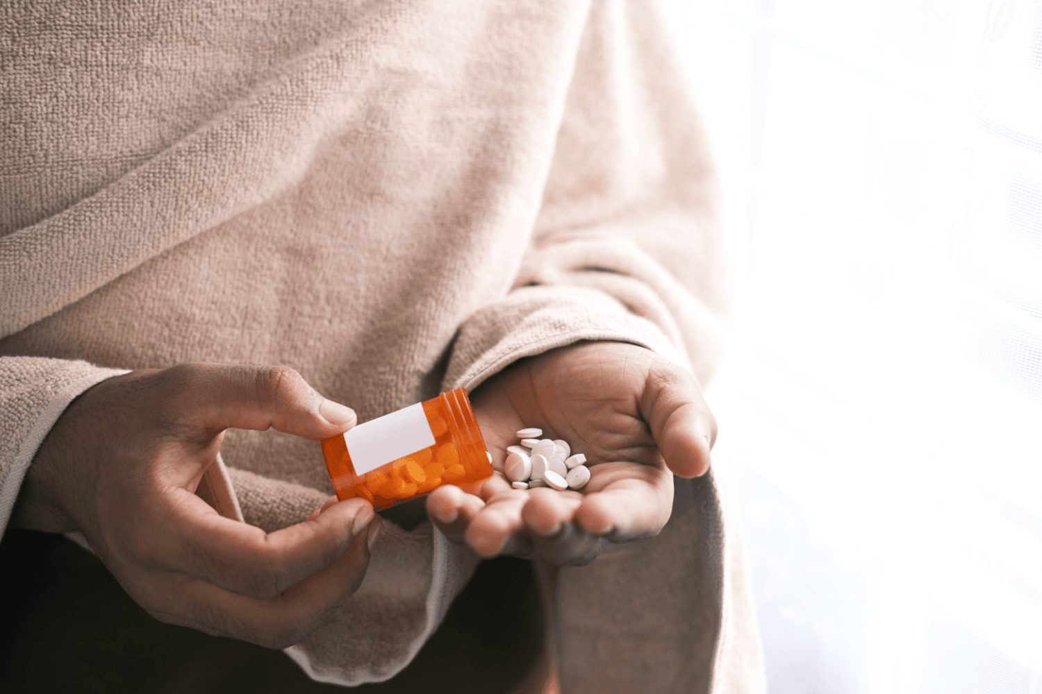 Image showing person taking pills