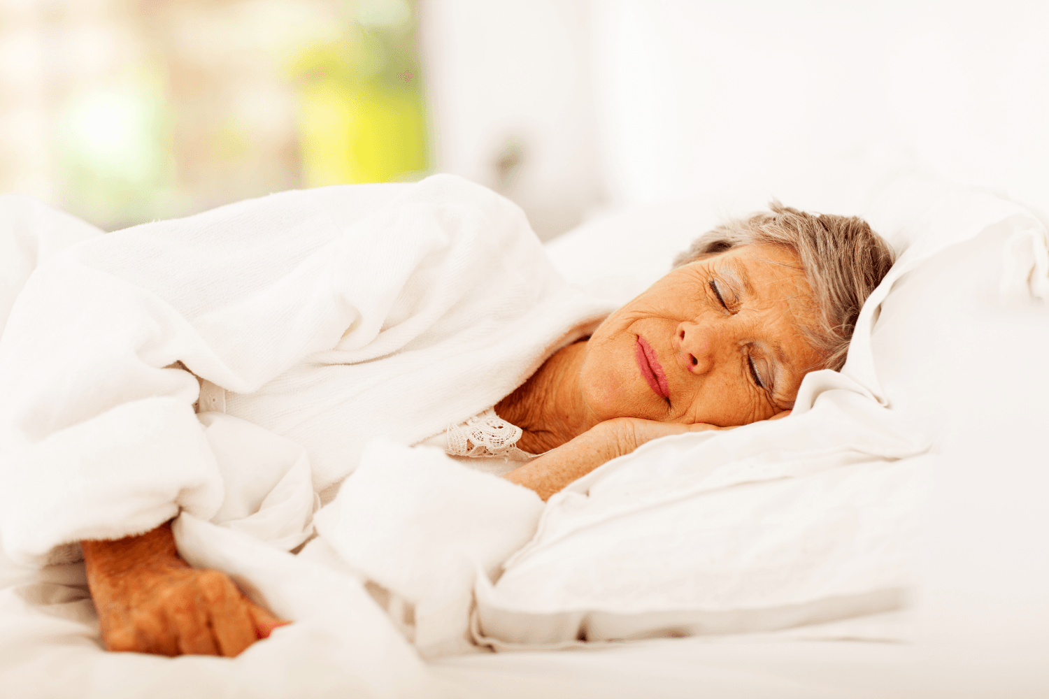 Older woman sleeping comfortably