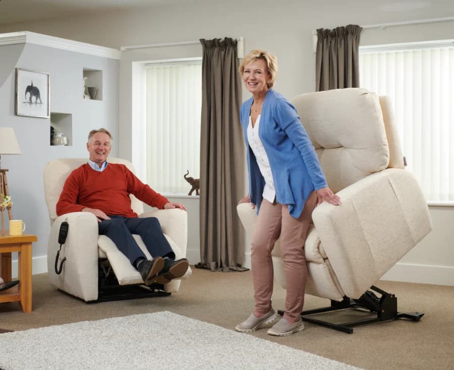 Couple sat in Oak Tree Mobility rise and recline chairs