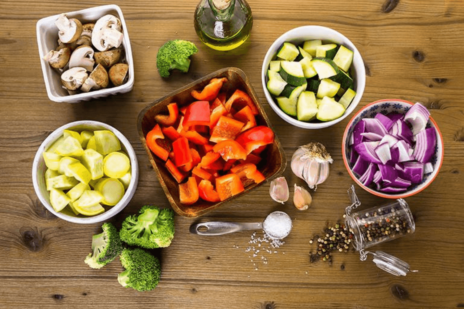 Image of food with vegetables and salt and pepper