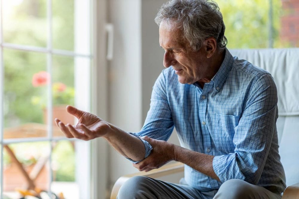 Man with Arthritis in arm