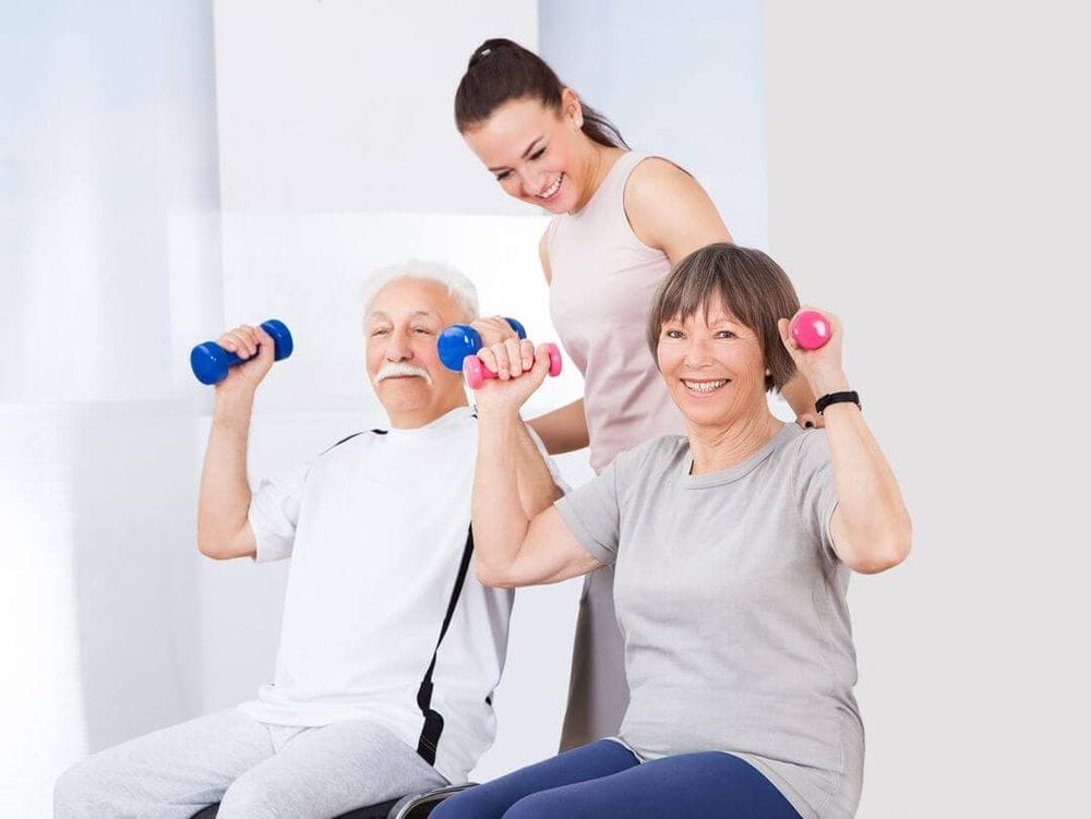 Elderly couple exercising