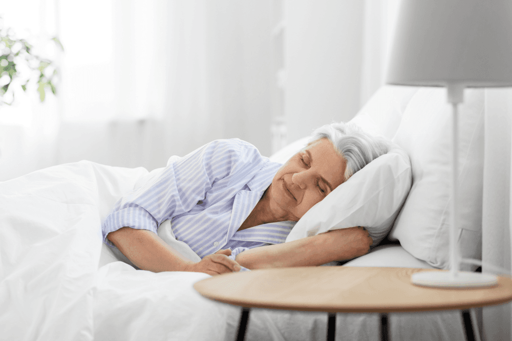 Lady sleeping in bed