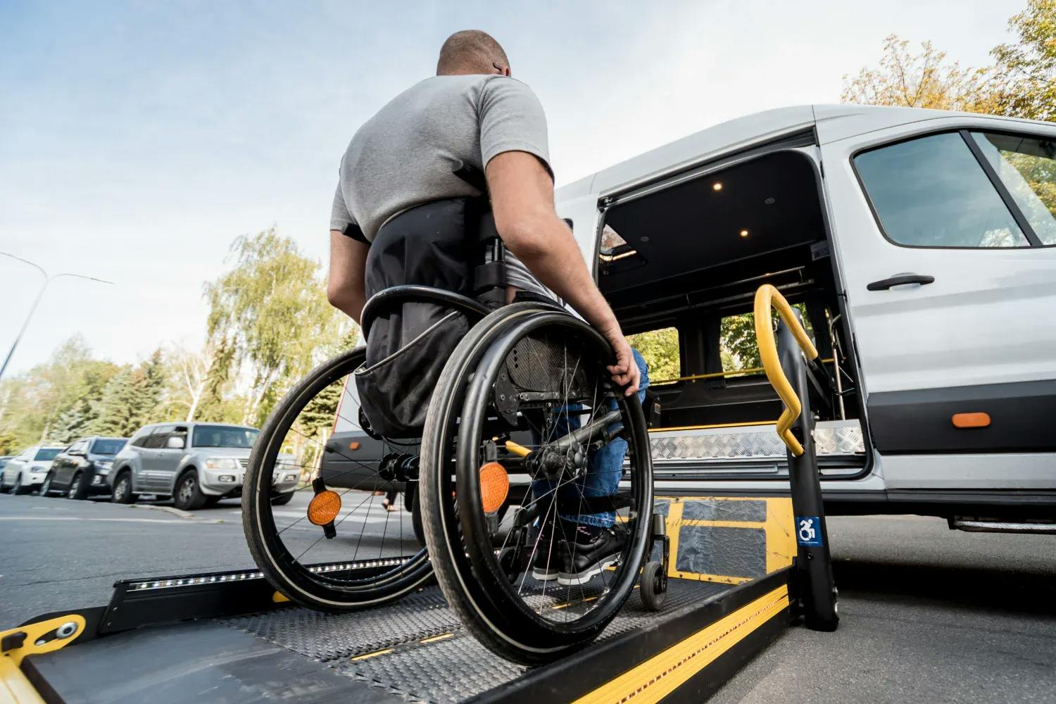 Wheelchair getting into a taxi