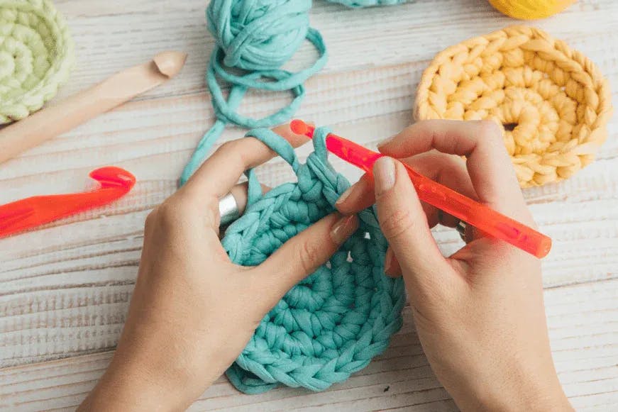 Crocheting with blue wool