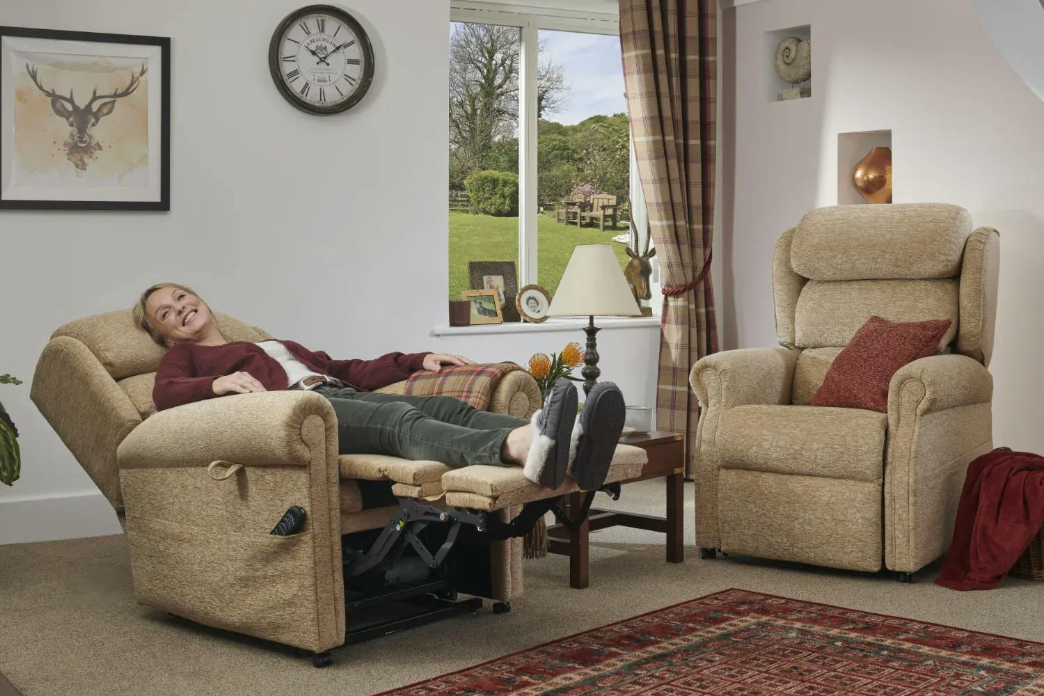 Woman in living room using a Oak Tree rise and recliner with unique high leg lift
