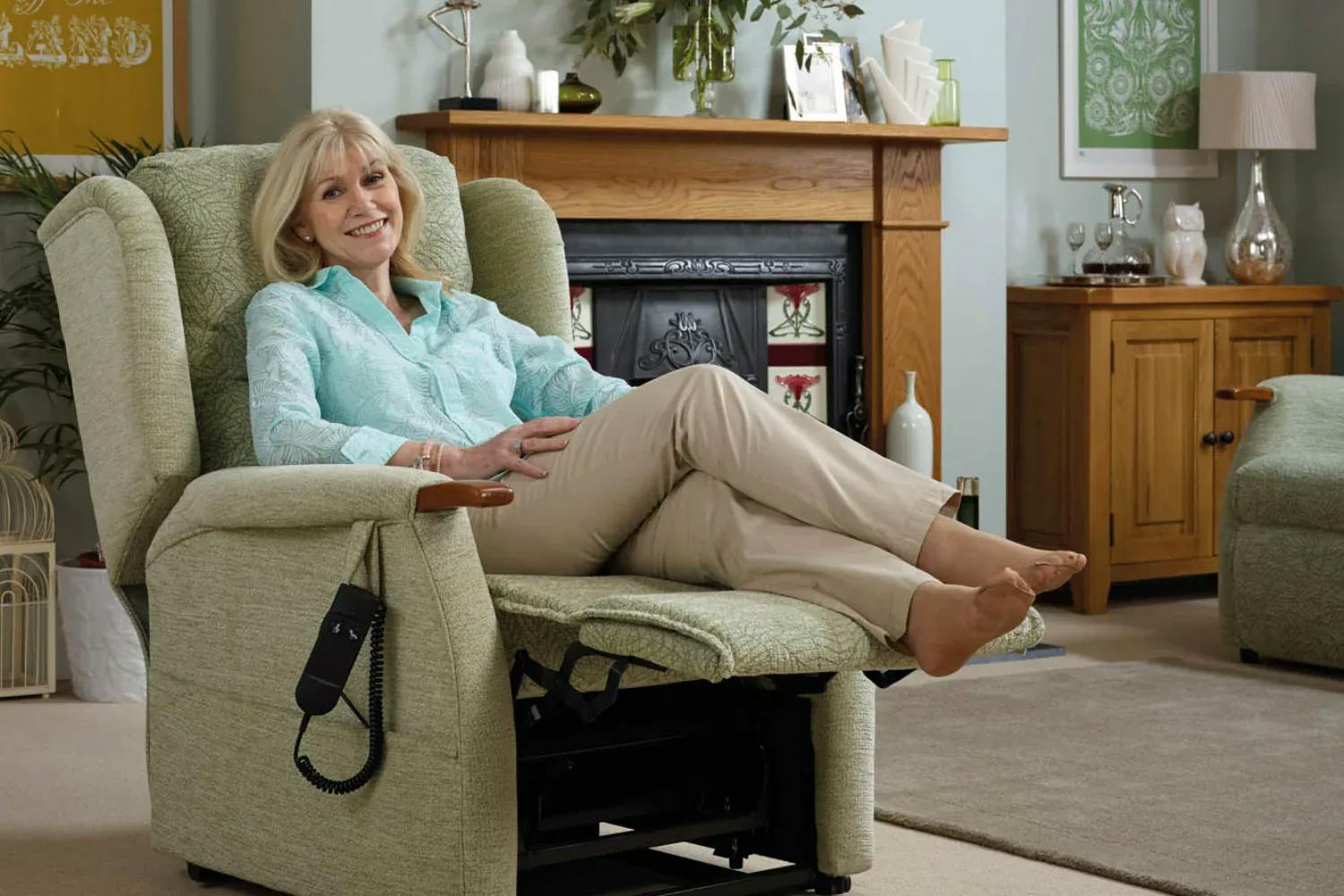 Woman sitting on Oak Tree Dual Motor rise and recliner