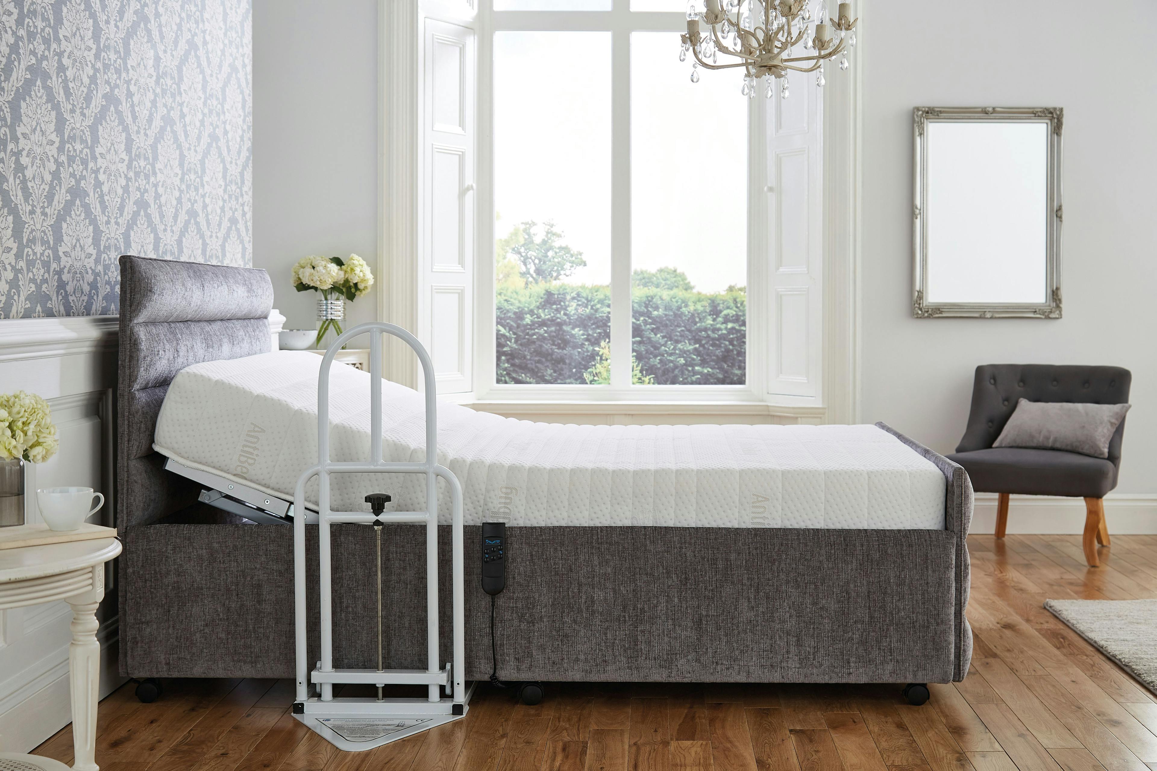 Image of our Warwrick double side on bed with bed rail.