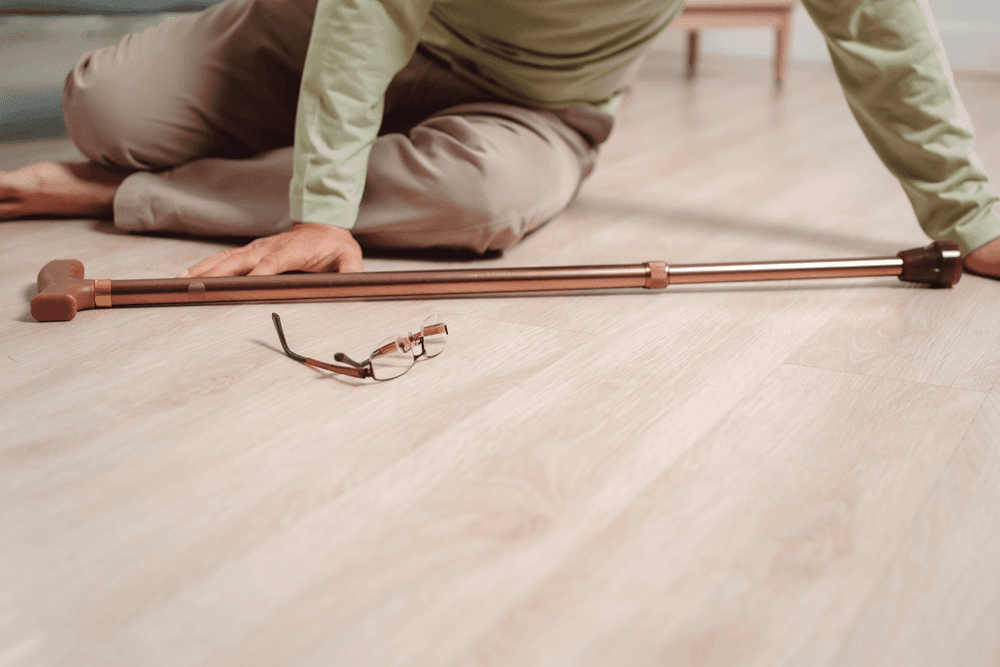 Elderly man on the floor after falling