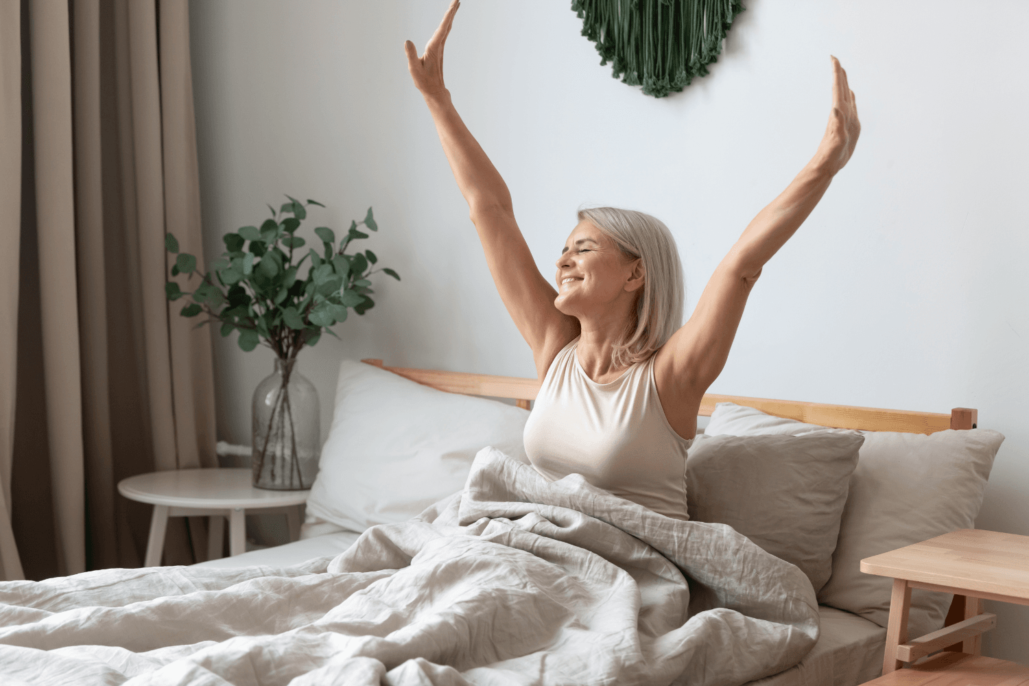Woman stretching after good sleep