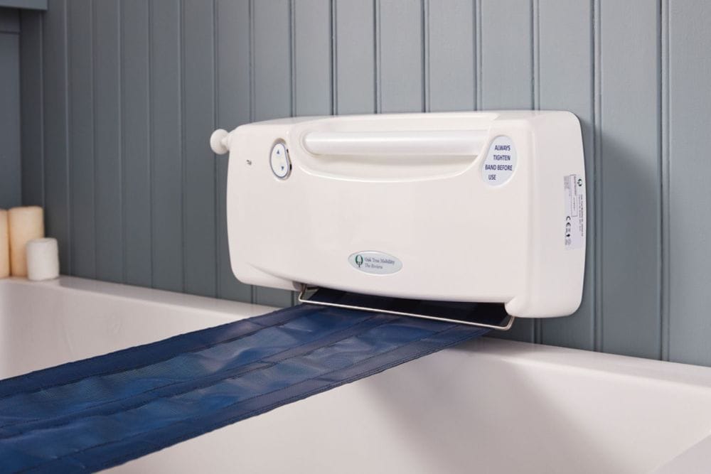 bath lift unit on a wall with the navy blue belt extended
