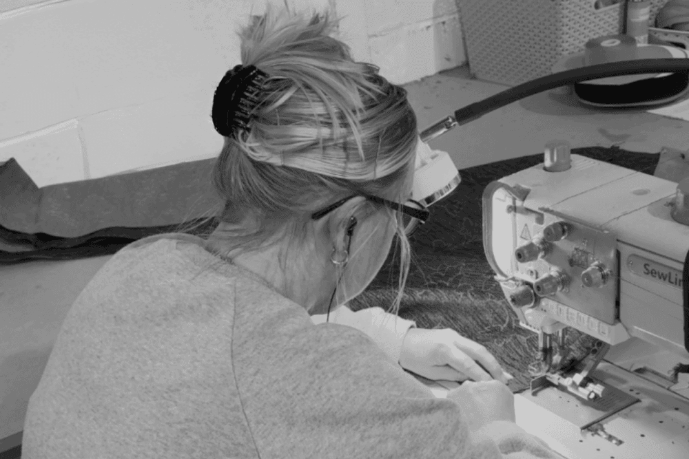 Lisa working at sewing machine