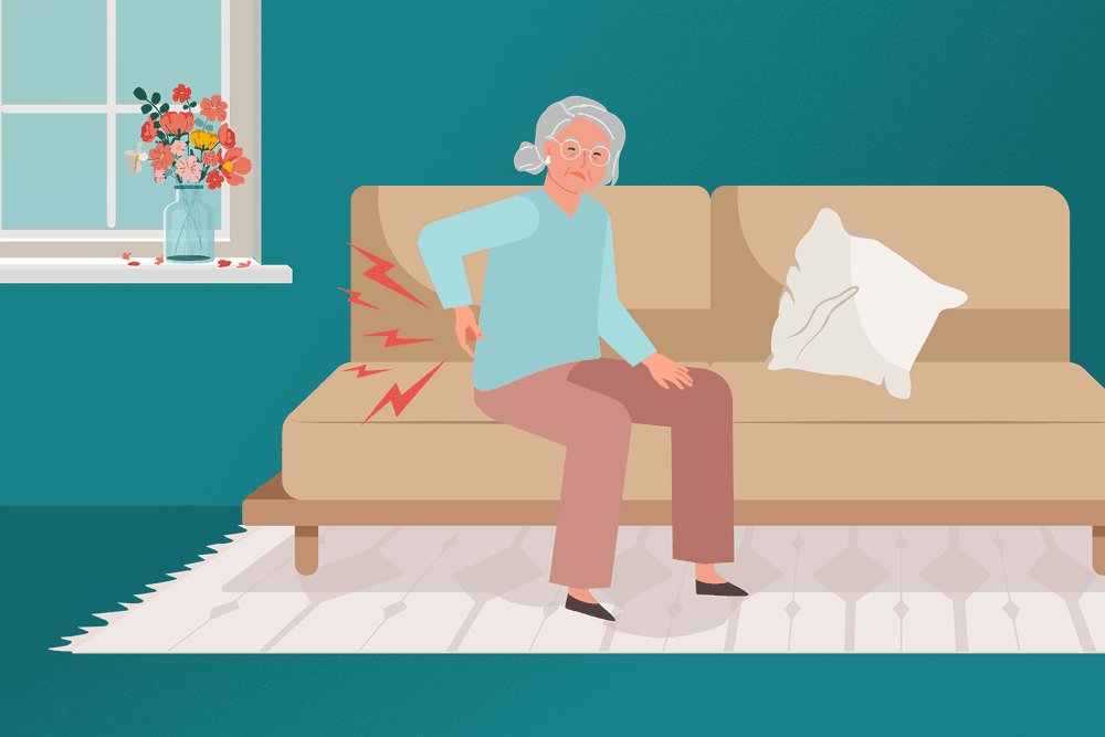 Illustration of older woman holding her lower back whilst sat on a sofa